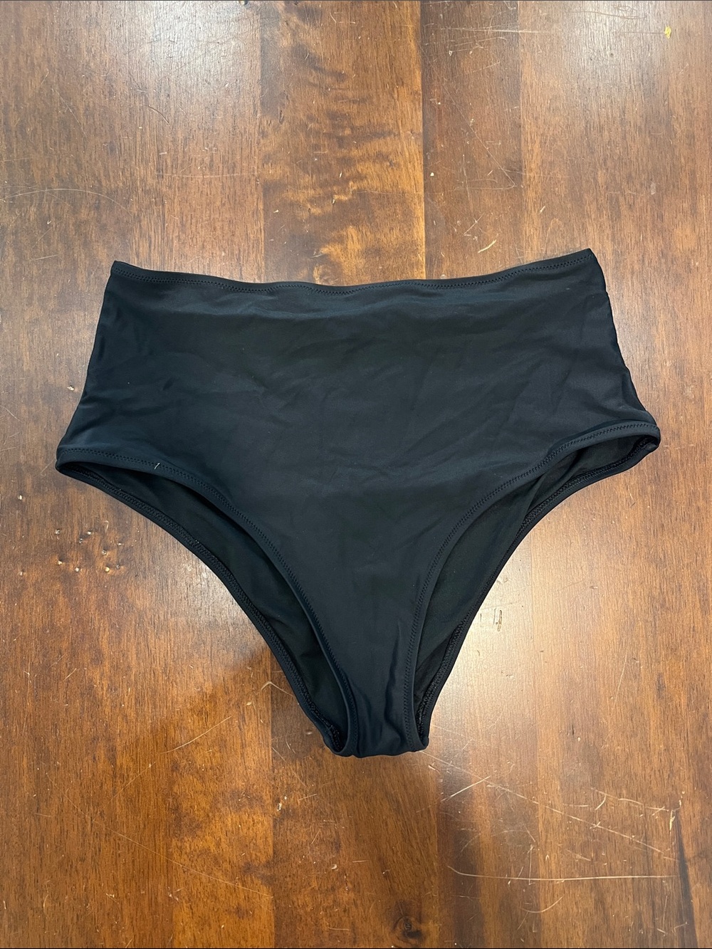 Black high waisted cheeky swim bottoms